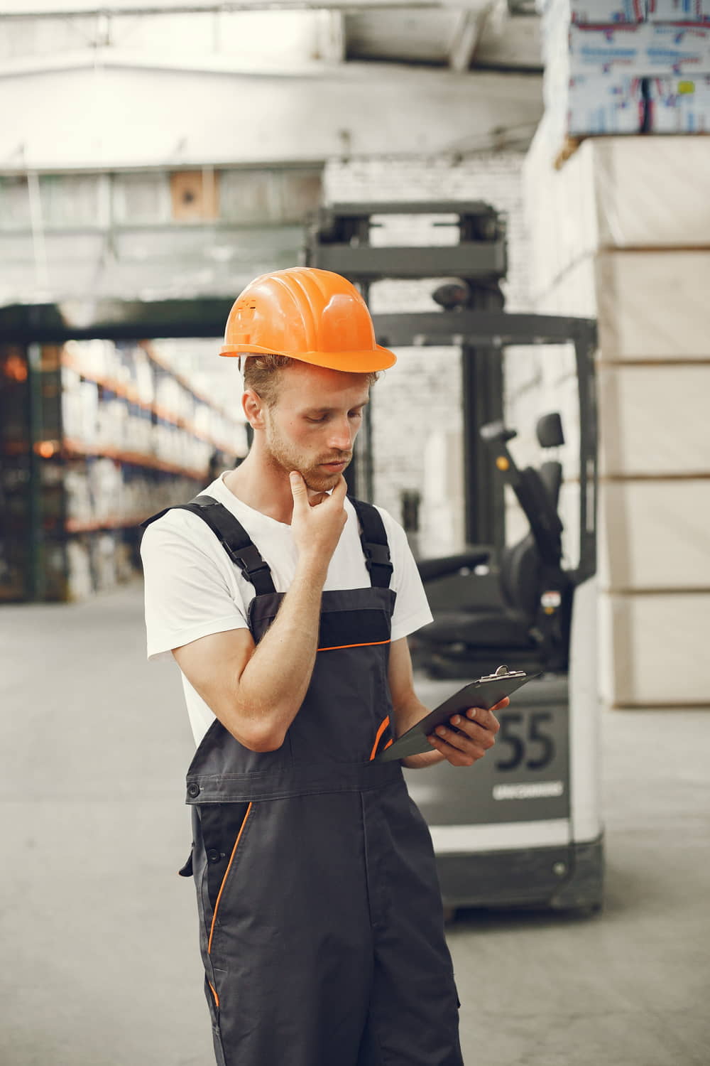 industrial-worker-indoors-factory-young-technician-with-orange-hard-hat